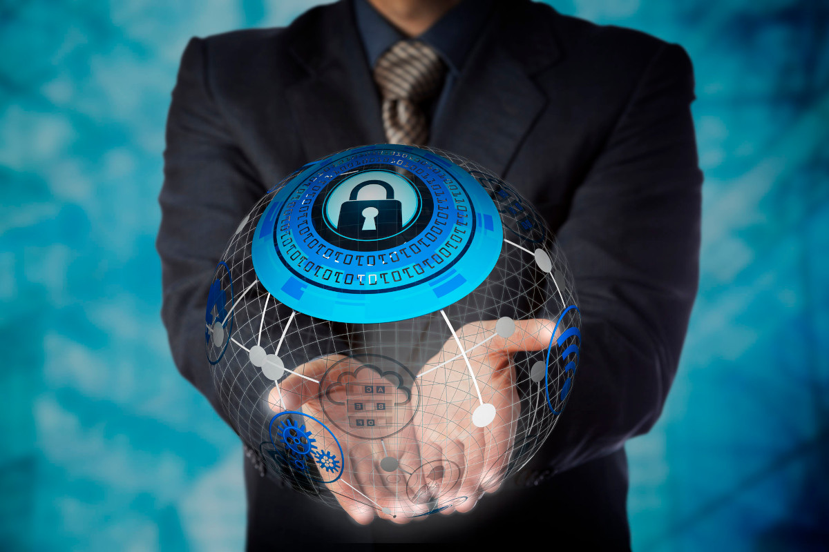 Man holding digital globe with security padlock on it